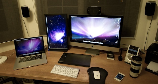Mac setup of a MacBook Pro, external display, and iMac 27