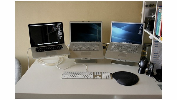 two macbooks and powerbook